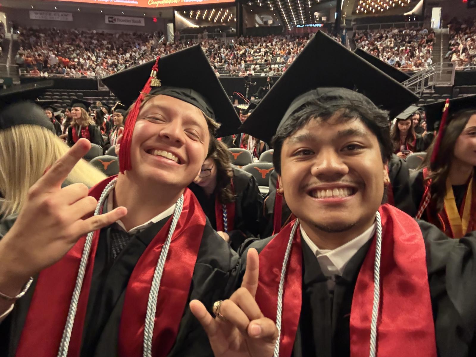 This is a picture of Jon and Elijah at the Commencement Ceremony of 2026 in the Moody Center. 