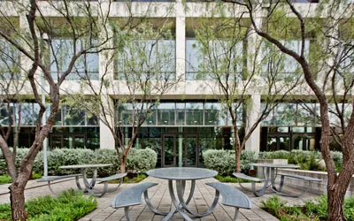 Tables outside of Moody College