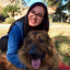 Photo of undergraduate researcher Brittany Hoang and her dog